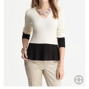Cream and black peplum sweater